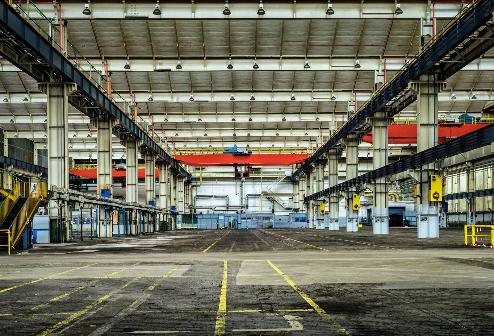 Structural steelwork being assessed and worked on in a workshop
